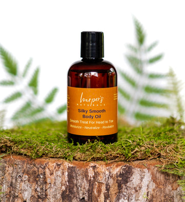 Harper's Naturals Silky Smooth Body Oil this oil is very light and can be applied to the face as well as whole body. Great for eczema and dry skin.